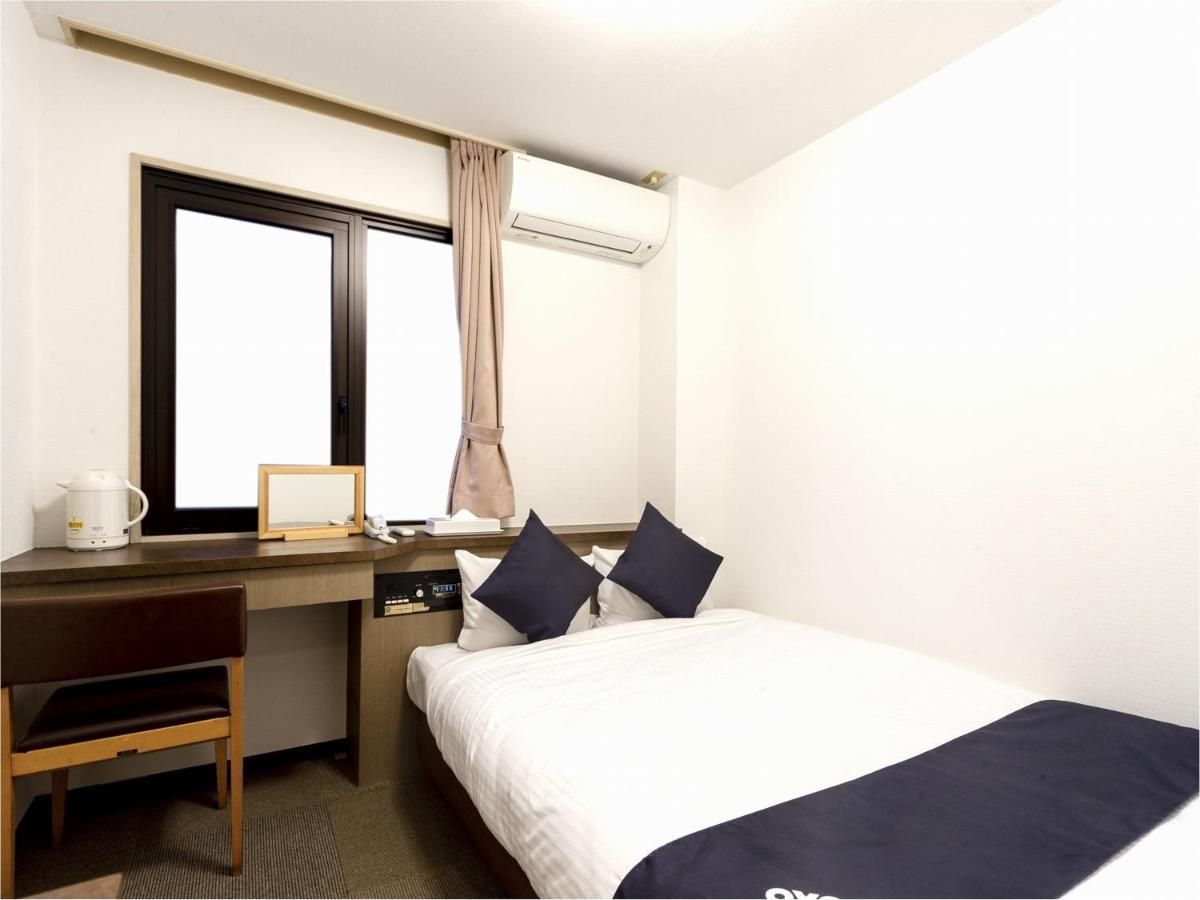 บิสซิเนส โฮเทล ยานางิ คีตากิวชุ โคกูระ Hotel คิตะคิวชู ภายนอก รูปภาพ